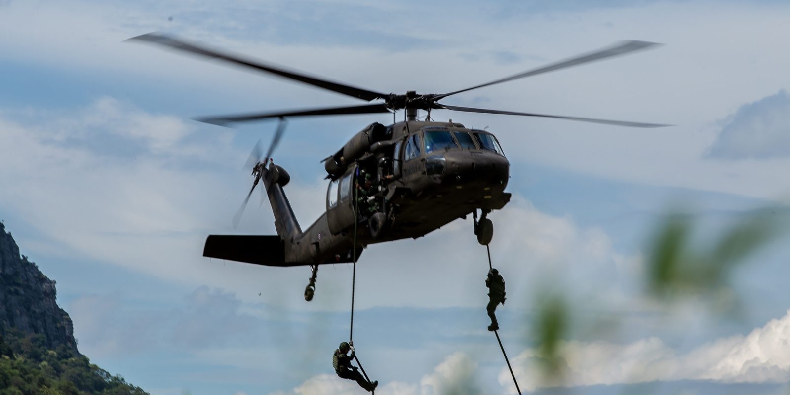 low-angle-view-helicopter-flying-against-sky